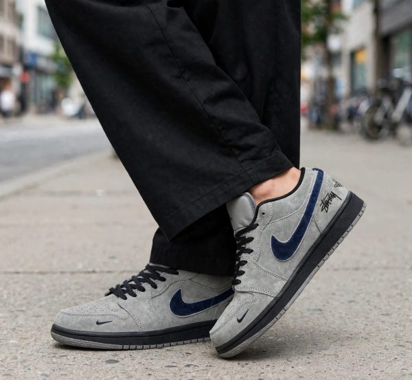 first-copy-air-jordans-retro-1-stussy-grey-bl-2 First Copy AIR JORDANS RETRO 1 STUSSY GREY BLUE KEYCHAIN 2026 ๐ค view 2