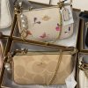 first-copy-coach-nolita-zipper-hardware-clasp First Copy Coach Nolita Top Quality Monogram Leather Shoulder Bag with Charms