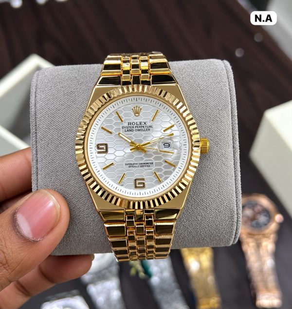 First Copy Elegant Rolex- Land Dweller Inspired Wristwatch Featuring Gold Design With A Fluted Bezel, Stylish Jubilee Bracelet view 1
