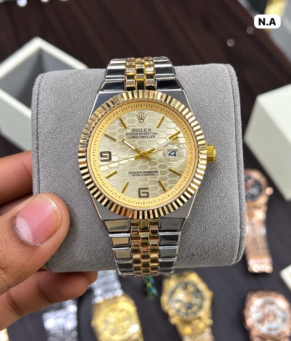 First Copy Elegant Rolex- Land Dweller Inspired Wristwatch Featuring Gold Design With A Fluted Bezel, Stylish Jubilee Bracelet view 2