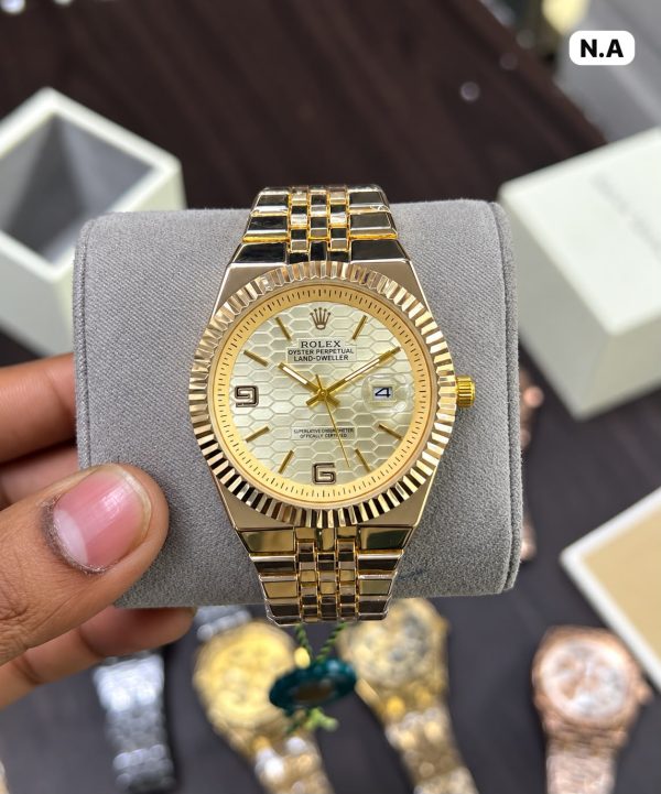 First Copy Elegant Rolex- Land Dweller Inspired Wristwatch Featuring Gold Design With A Fluted Bezel, Stylish Jubilee Bracelet view 3