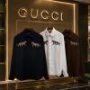 First Copy This GUCCI Shirt Combines Style And Comfort, Making It Perfect For Leisurely PARTY WEAR, Relaxing Days. Made From KOREAN FABRIC , It Features Full Sleeves HEAVY HAND PAINT WITH SEQUENCE WORK. view 1