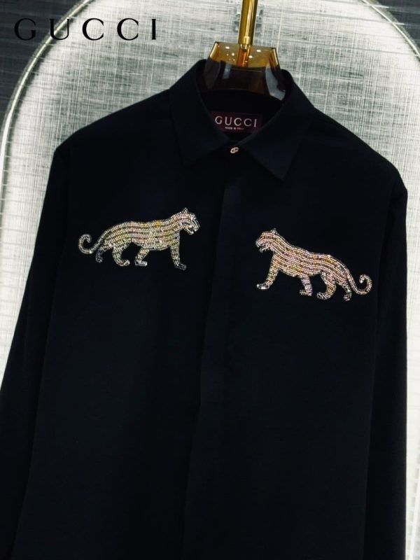 First Copy This GUCCI Shirt Combines Style And Comfort, Making It Perfect For Leisurely PARTY WEAR, Relaxing Days. Made From KOREAN FABRIC , It Features Full Sleeves HEAVY HAND PAINT WITH SEQUENCE WORK. view 2