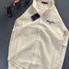 First Copy TOMMY HILFIGER Linen Collection Shirts Combines Style And Comfort, Making It Perfect For Leisurely, Relaxing Days. Made From Very Premium SOFT COTTON, It Features Long Sleeves, Brand Logo And A Classic Collar. view 1