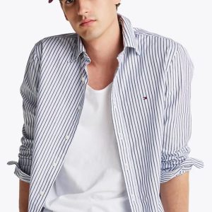 First Copy TOMMY HILFIGER ORIGINAL Collection Shirts Combines Style And Comfort, Making It Perfect For Leisurely, Relaxing Days. Made From Very Premium COTTON, It Features Long Sleeves, Brand Logo And A Classic Collar. view 1