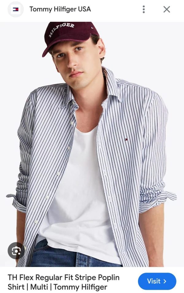 First Copy TOMMY HILFIGER ORIGINAL Collection Shirts Combines Style And Comfort, Making It Perfect For Leisurely, Relaxing Days. Made From Very Premium COTTON, It Features Long Sleeves, Brand Logo And A Classic Collar. view 1