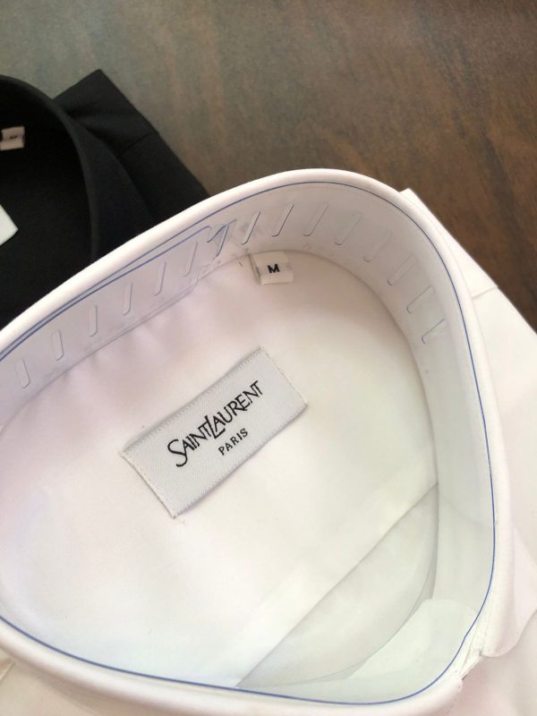 First Copy YSL ORIGINAL Collection Shirts Combines Style And Comfort, Making It Perfect For Leisurely, Relaxing Days. Made From Very Premium Cotton LYCRA , It Features Long Sleeves, Brand Logo And A Classic Collar. view 3